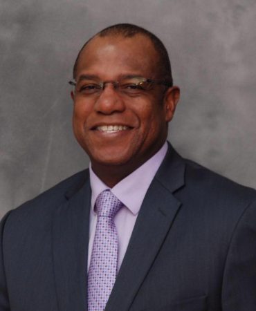Photo of man smiling at camera