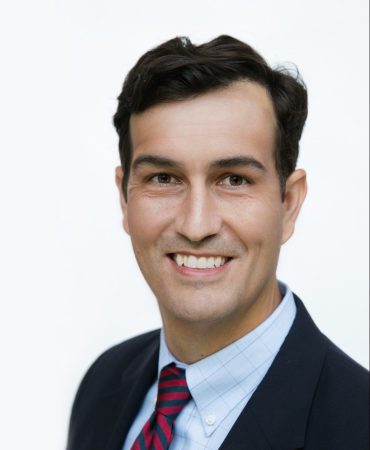 Photo of man smiling at camera