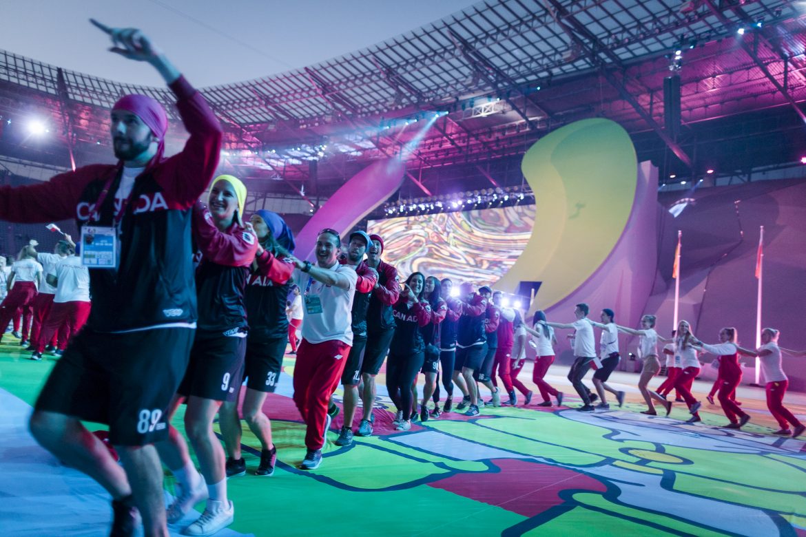 Photo of Canadian athletes in a conga line