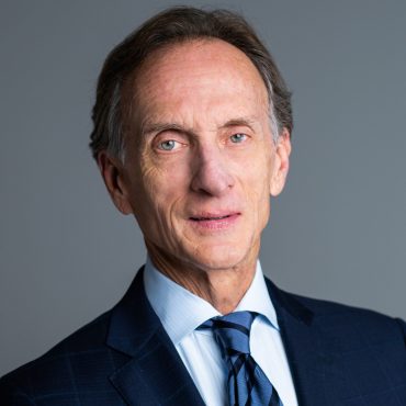 Photo of man smiling at camera