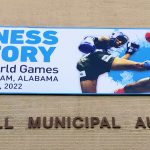Photo of Boutwell Auditorium exterior with World Games banner for Muay Thai