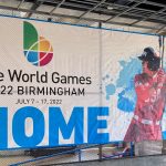 Photo of TWG banner with softball player